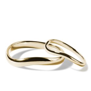 Netradiční snubní prsteny wave ze žlutého 14k zlata KLENOTA