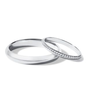Originální snubní prsteny z bílého zlata se zakřiveným profilem KLENOTA